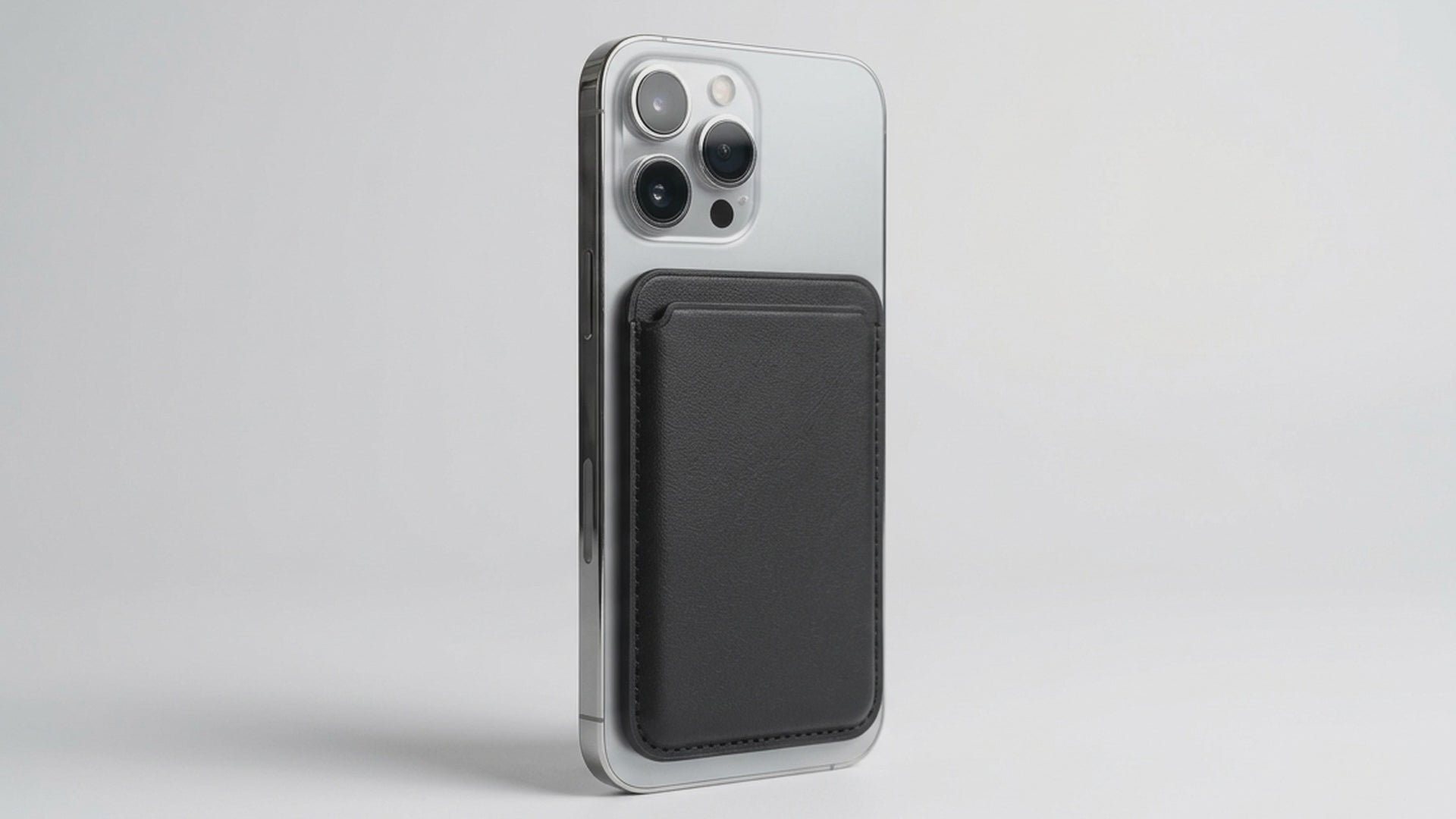 AI-styled product video of a black magnetic wallet and phone stand. Phone shown for illustration; not included.